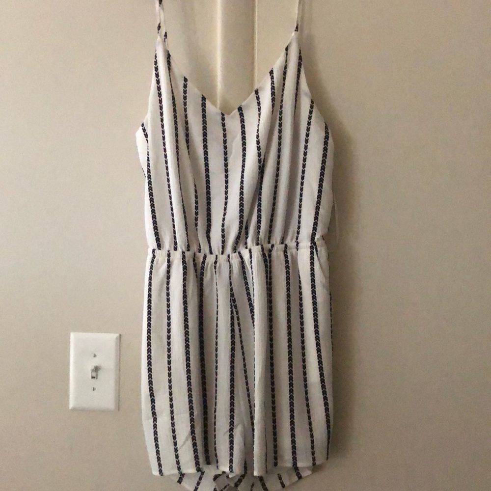 White romper with chevron lines